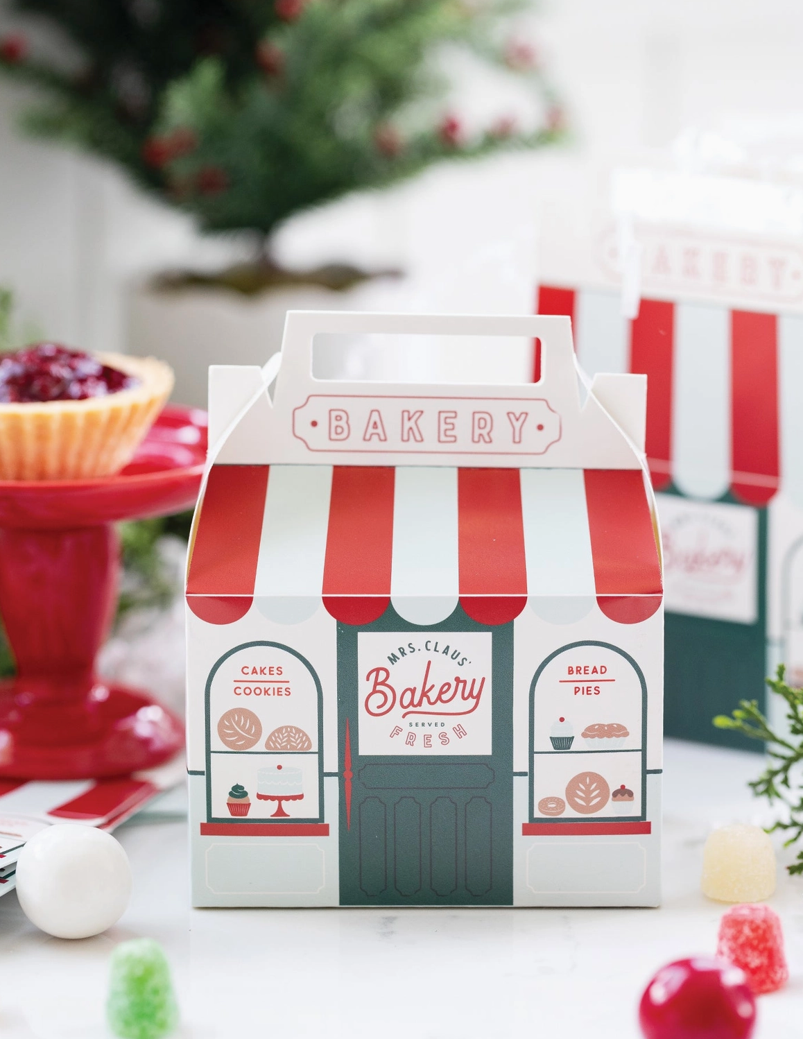 Bakery-themed gift box with red and white striped design on a festive background