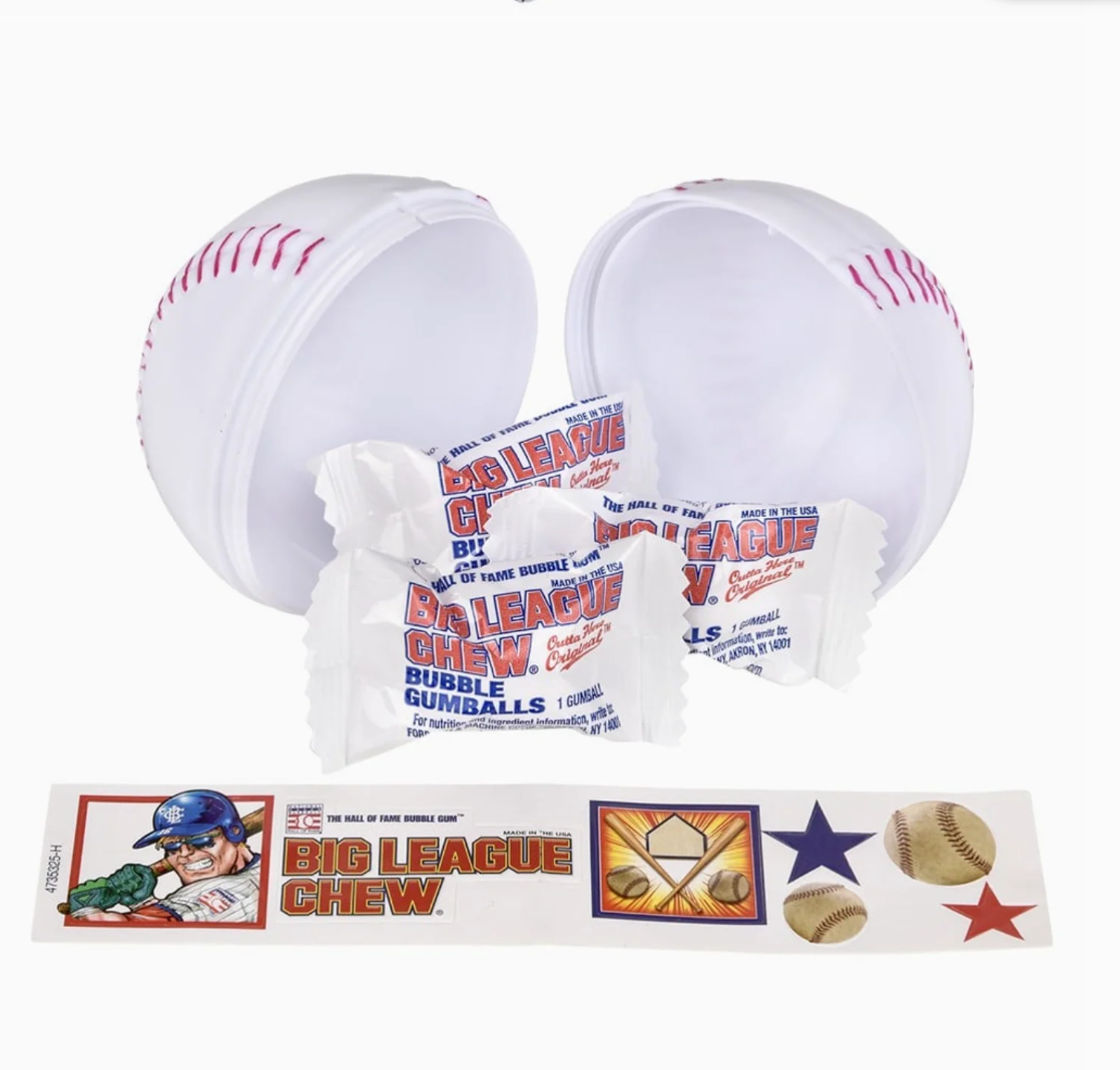 Big League Chew packaging with gumball containers and a box featuring baseball graphics.