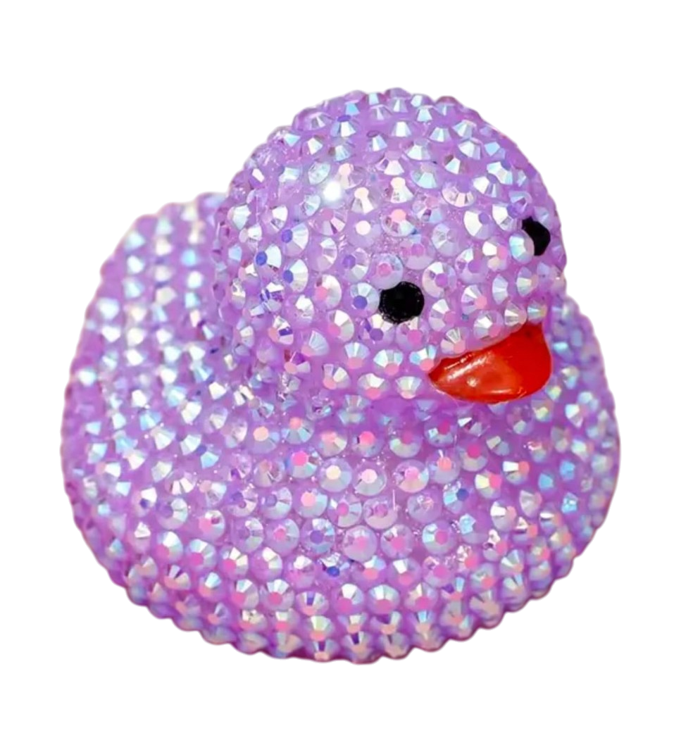 Purple glittery rubber duck with a red beak on a white background