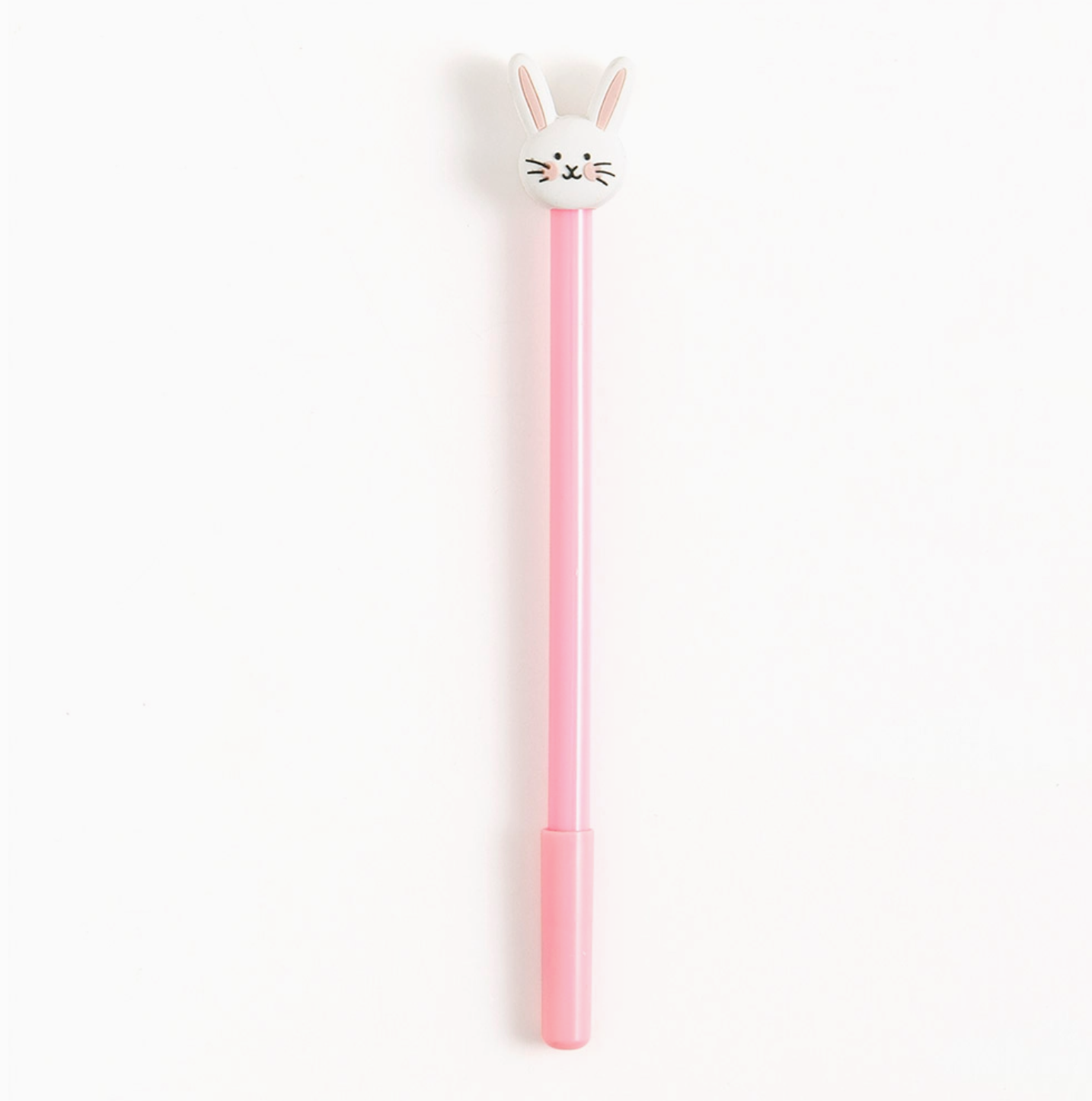 A pink barrel pen with a custom-designed bunny topper on a white background.