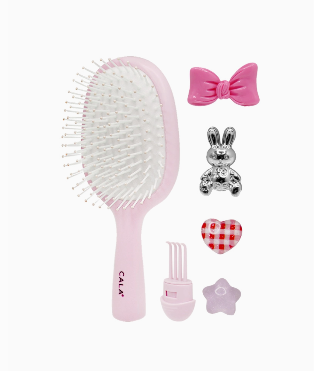 Pink hairbrush set with accessories on a white background