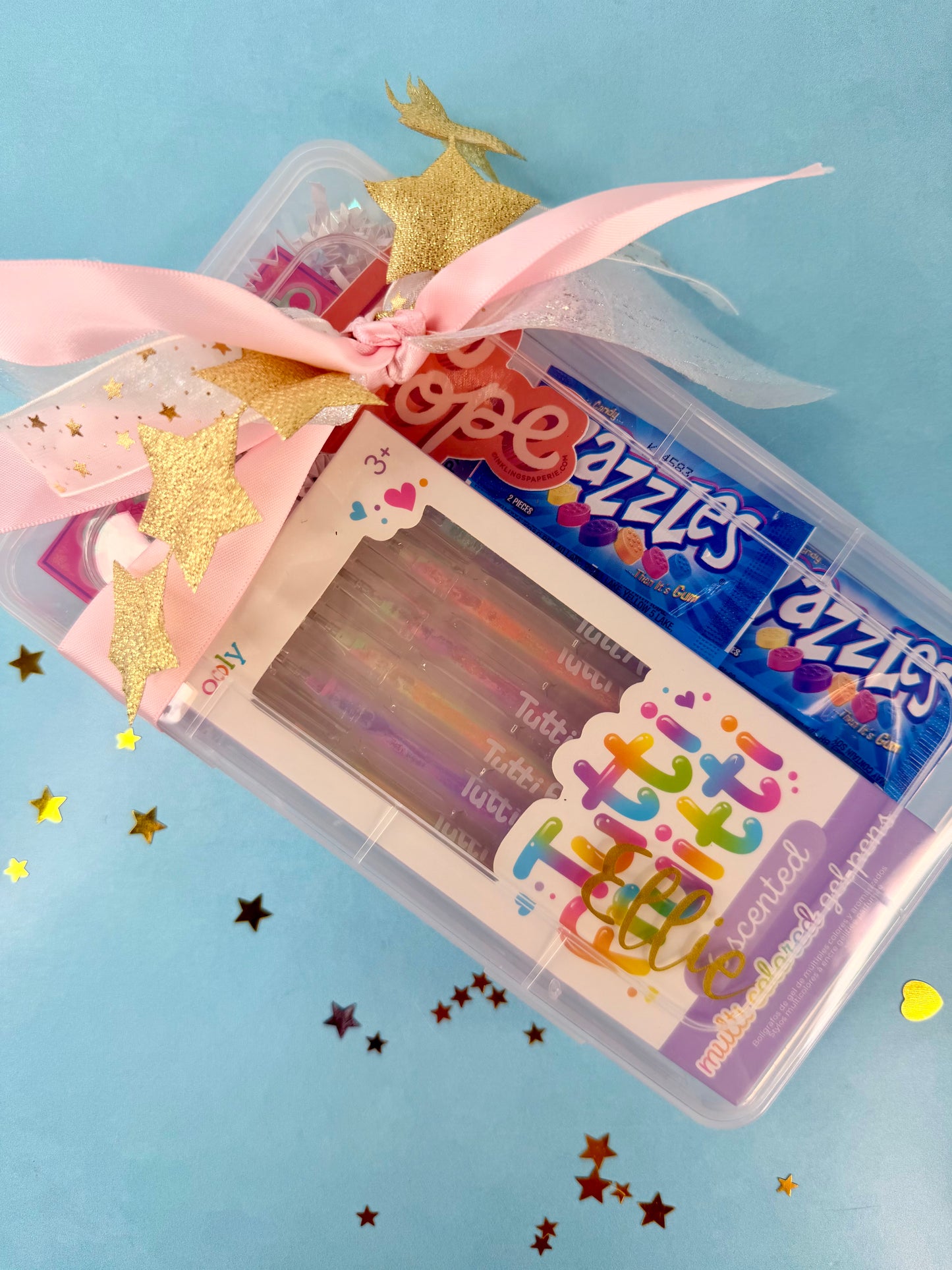 Decorative box with colorful text and stars on a blue background