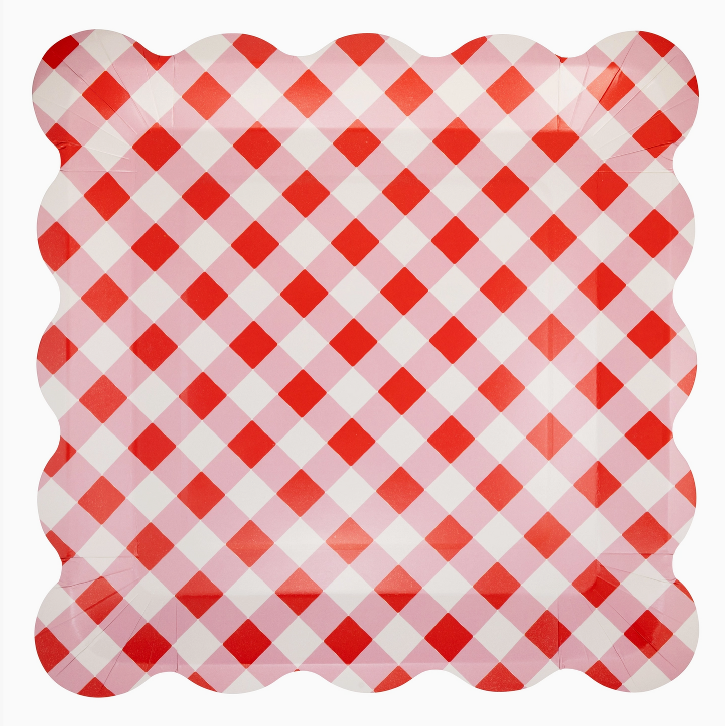 Red and white checkered plate with scalloped edge on a white background