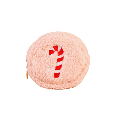 Pink fluffy pouch with a candy cane design on a beige background