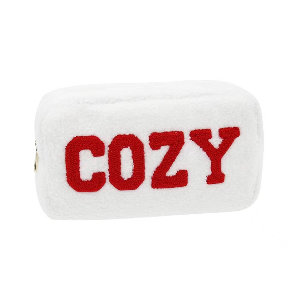 White plush toy with 'COZY' text in red on a white background