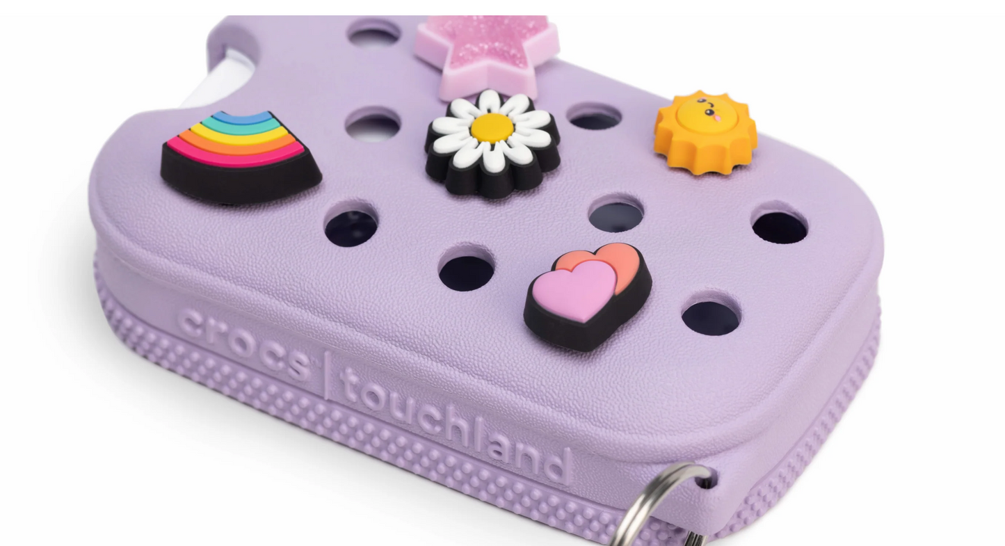 Purple toy with colorful decorations on a white background