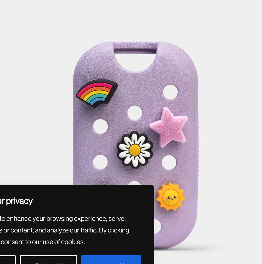 Purple case with colorful stickers on a light gray background