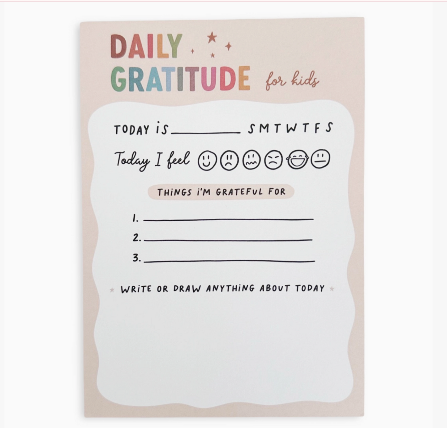 A daily gratitude card for kids featuring a pastel pink background with a large white wavy border. The top reads 'DAILY GRATITUDE for kids' in colorful lettering, and the card includes fields to write down today's activities and three things to be grateful for, along with a smiley face emoji row.