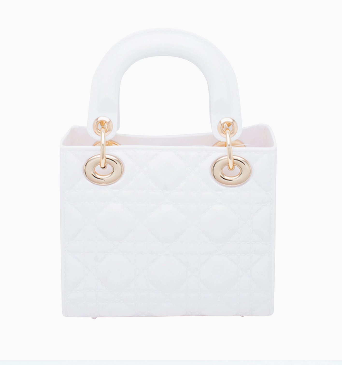 White handbag with gold handles on a white background