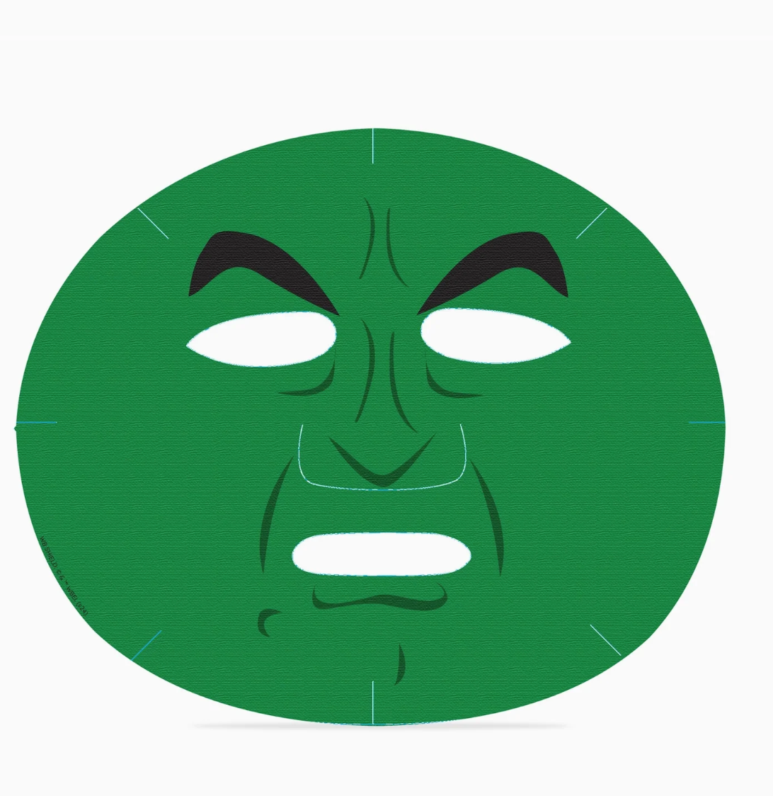 Green face mask with a stylized face on a white background