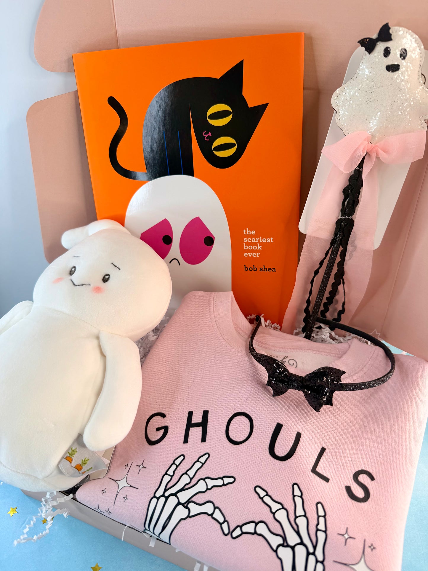 Pink Ghouls Halloween gift box for girls ages 3–6 with a Halloween top, ghost plush, book and spooky accessories.
