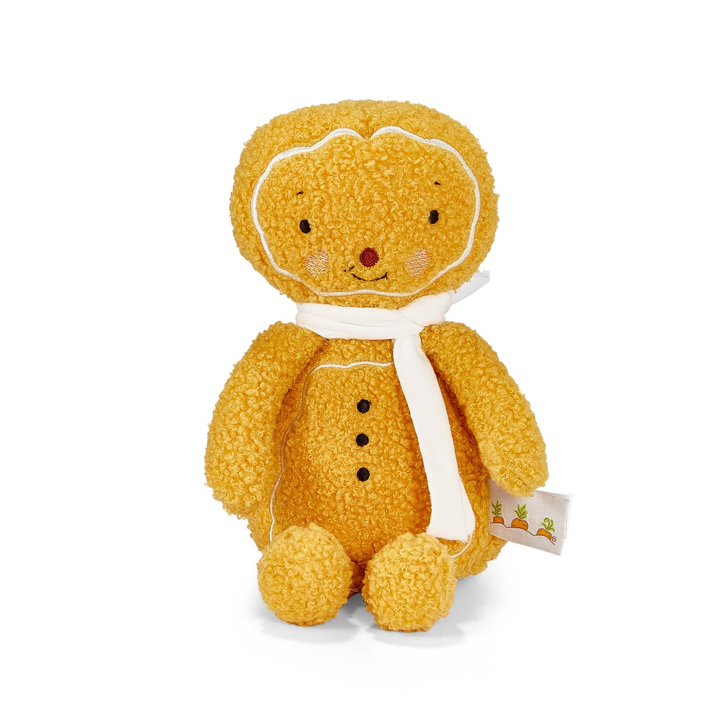 A yellow teddy bear plush toy with a white scarf, photographed against a plain white background.