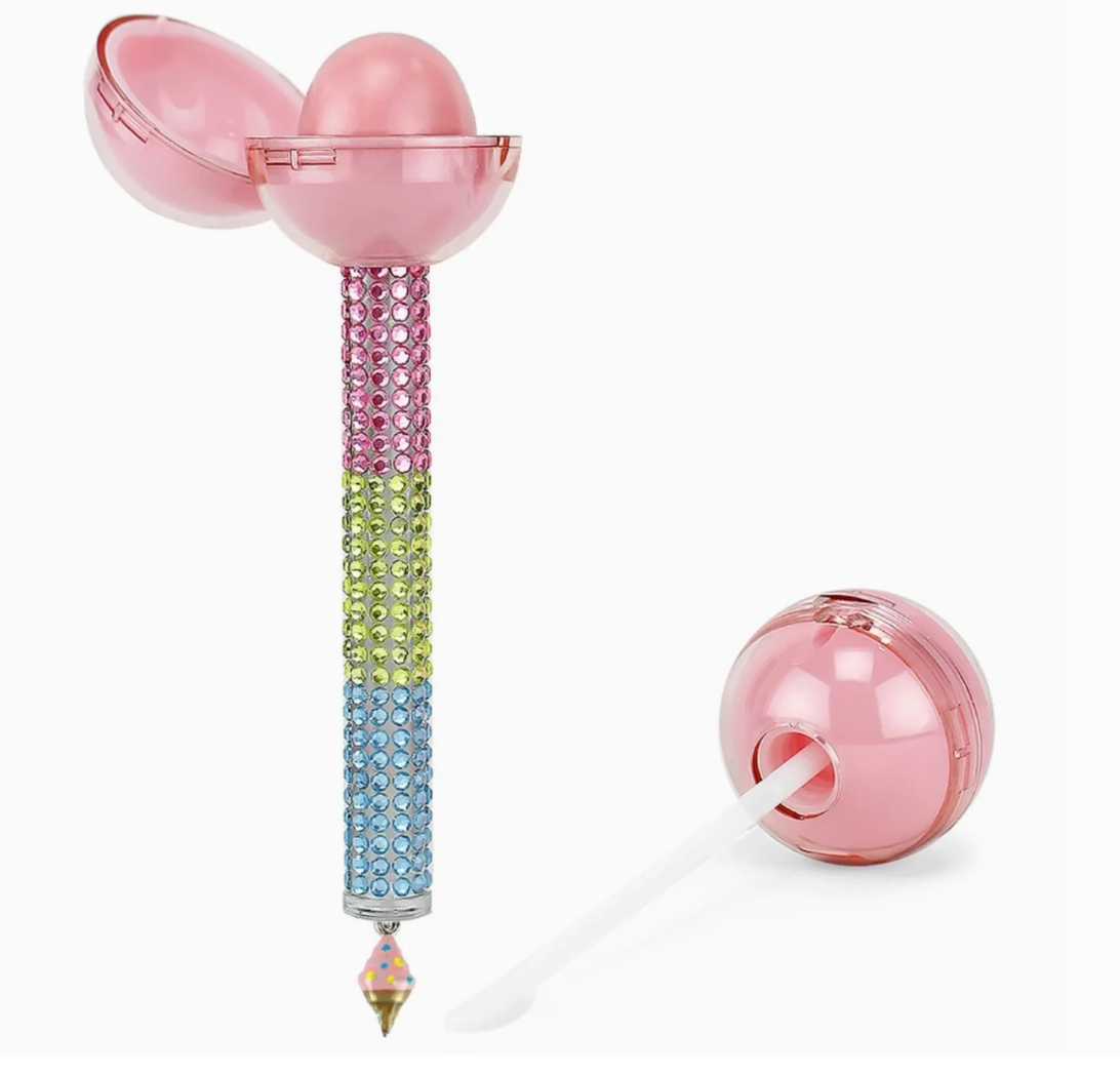 Decorative pen with pink and multicolored design on a white background