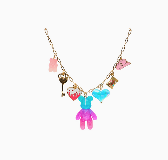 Necklace with colorful charms including a teddy bear, heart, and key on a white background