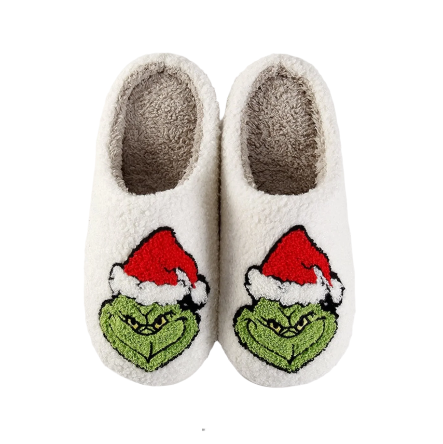 A pair of white fuzzy slippers with a Christmas themed design featuring the character 'The Grinch' with a Santa hat and a green nose.