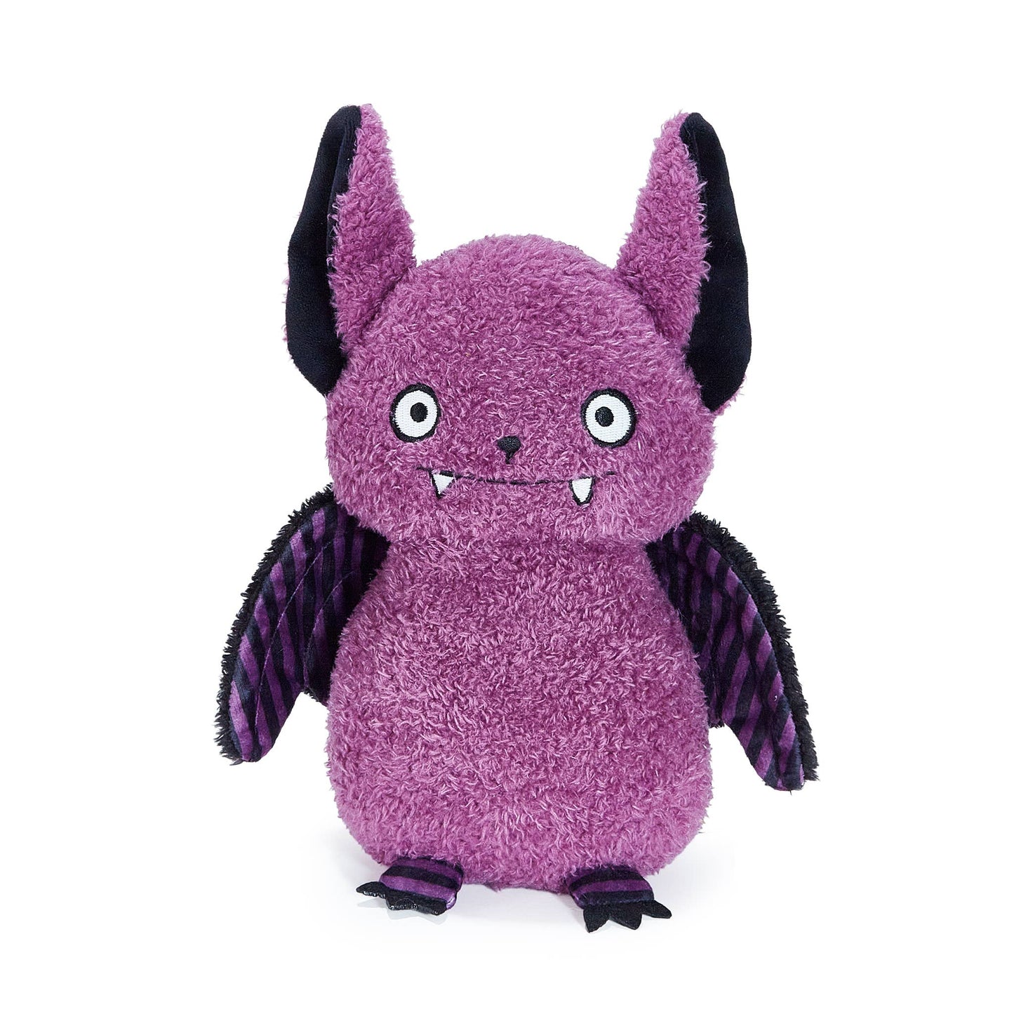 Purple plush toy with bat wings on a white background