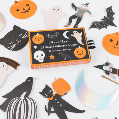 Box of Meri Meri Halloween stickers with various shaped stickers on a white background