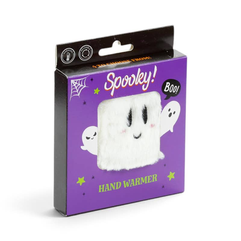 A packaged plush ghost hand warmer in a purple Halloween box with 'Spooky! HAND WARMER' text and a visible white fuzzy ghost insert.
