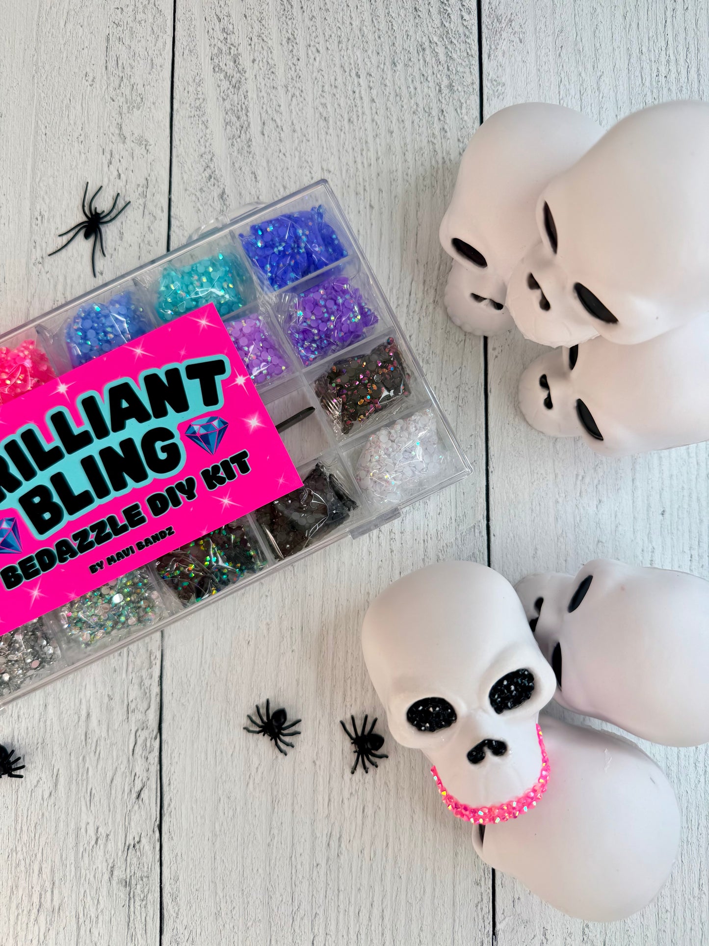 Halloween squishy skull bling activity kit with six white skulls and colorful rhinestones
