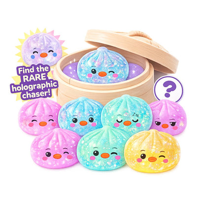 Colorful plush toys with faces in a wooden steamer basket on a white background