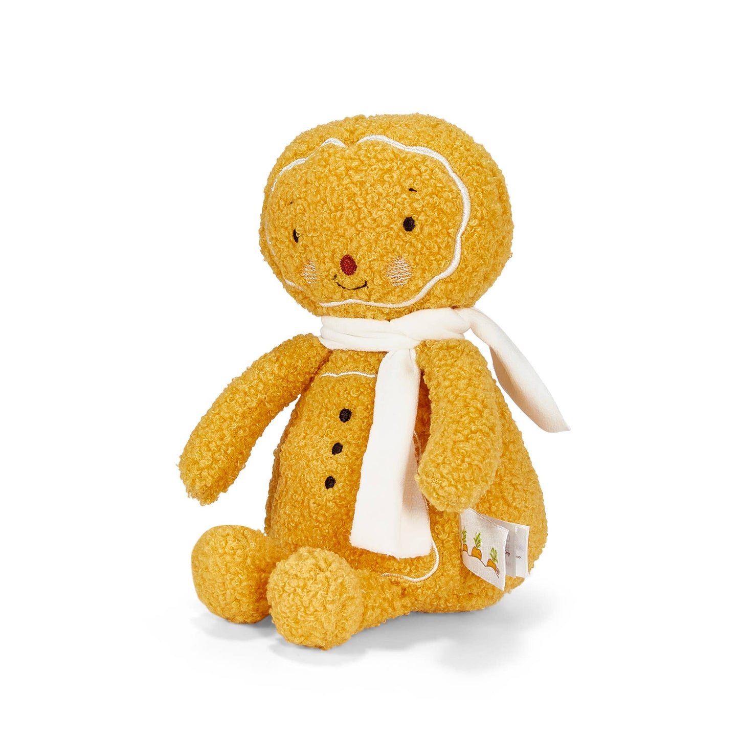 Yellow plush gingerbread man toy on a white background