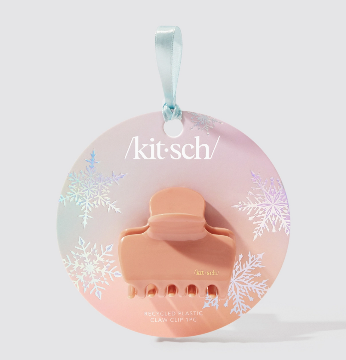 Pink silicone product with snowflake design on a white background, featuring the 'kit-sch' brand.