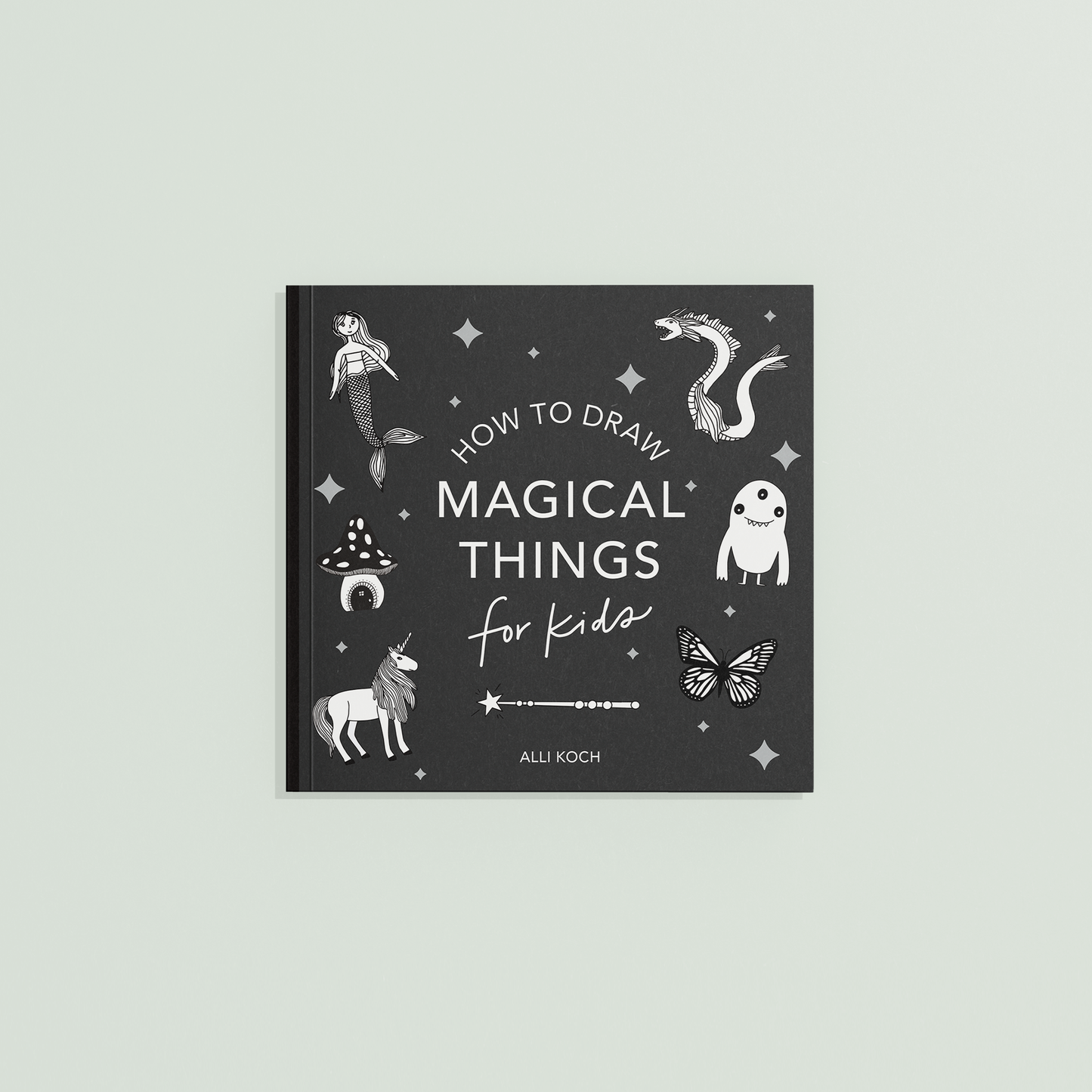 Book titled 'How to Draw Magical Things for Kids' with illustrations on a gray background