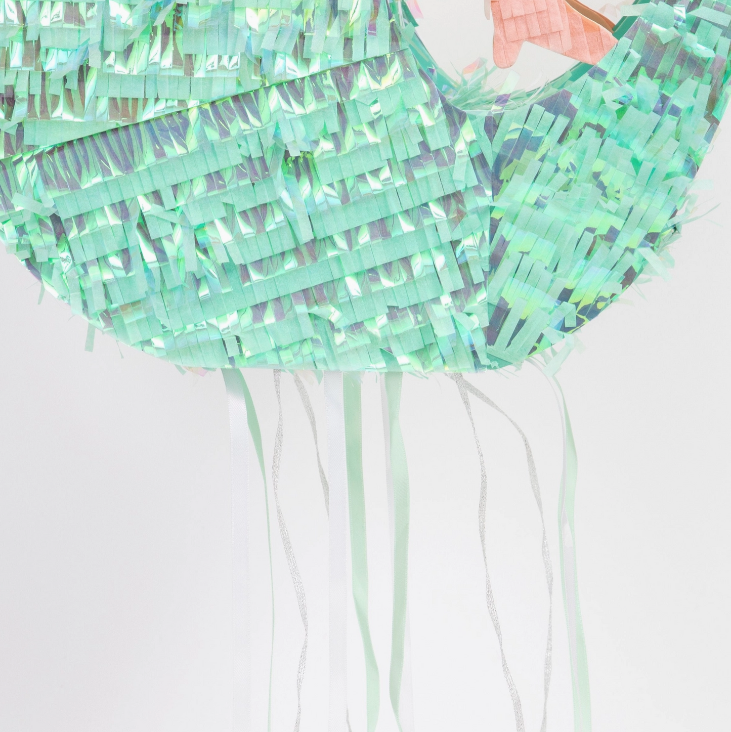 Green layered dress with fringe on a white background