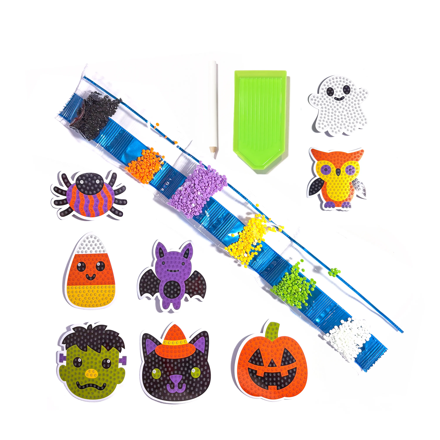Halloween-themed craft kit with beads and accessories on a white background