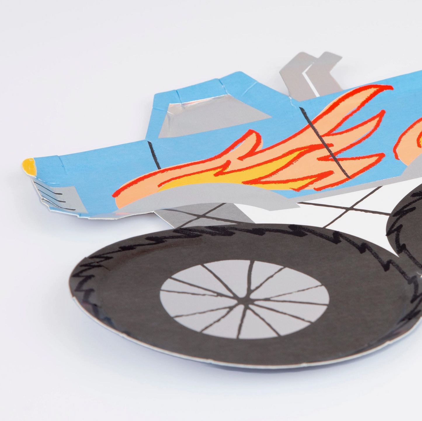 Toy car with flames on a white background