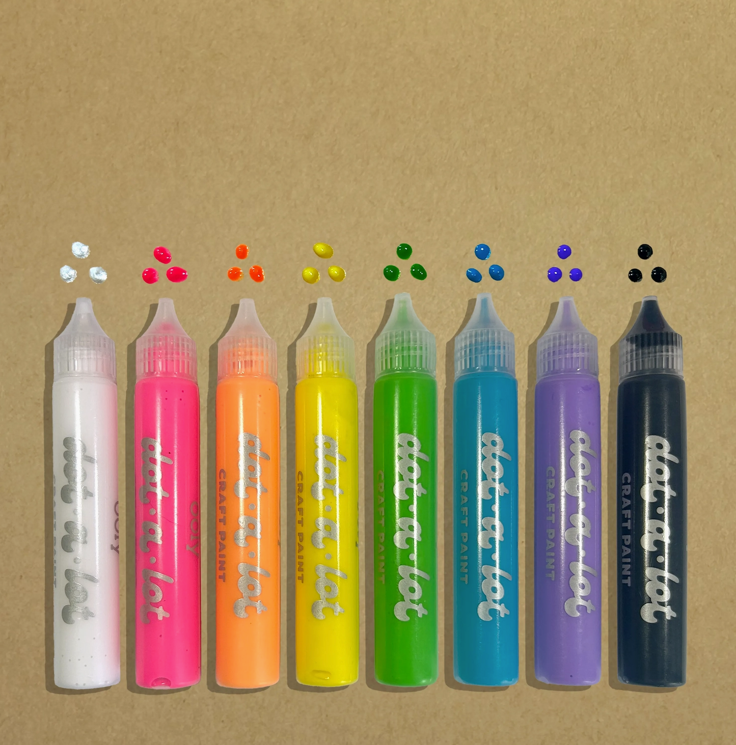Set of eight colorful Dot-a-Lot craft paint bottles on a brown background