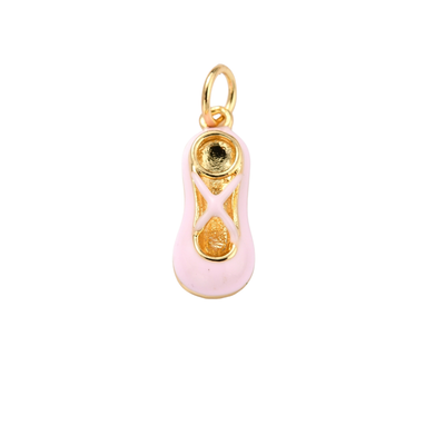 Pink sandal charm with gold accents on a white background