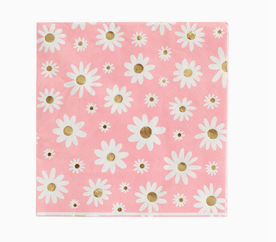 Pink fabric with white daisy flowers and gold centers on a white background