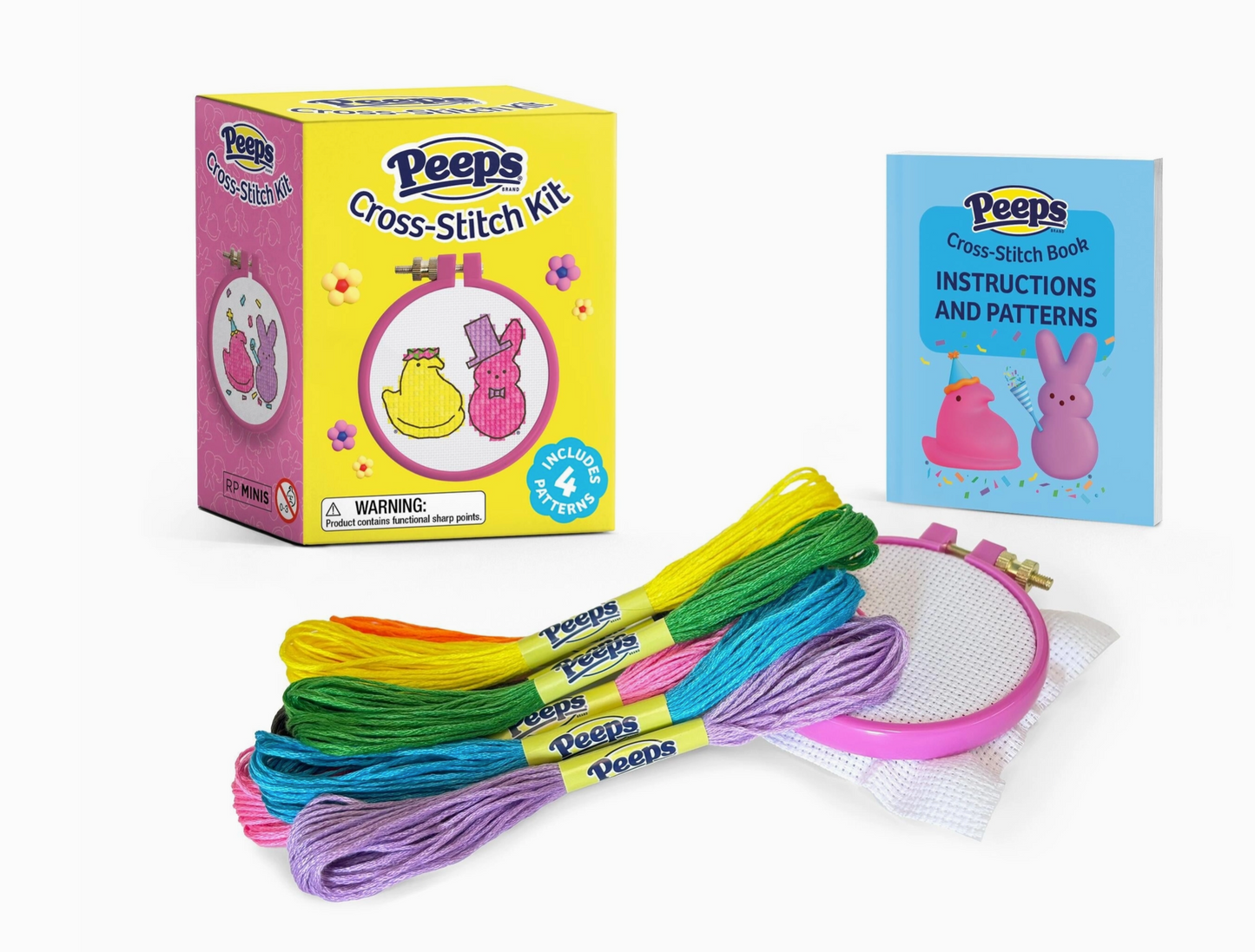 Peeps cross-stitch kit with colorful threads, hoop, and instructions on a white background