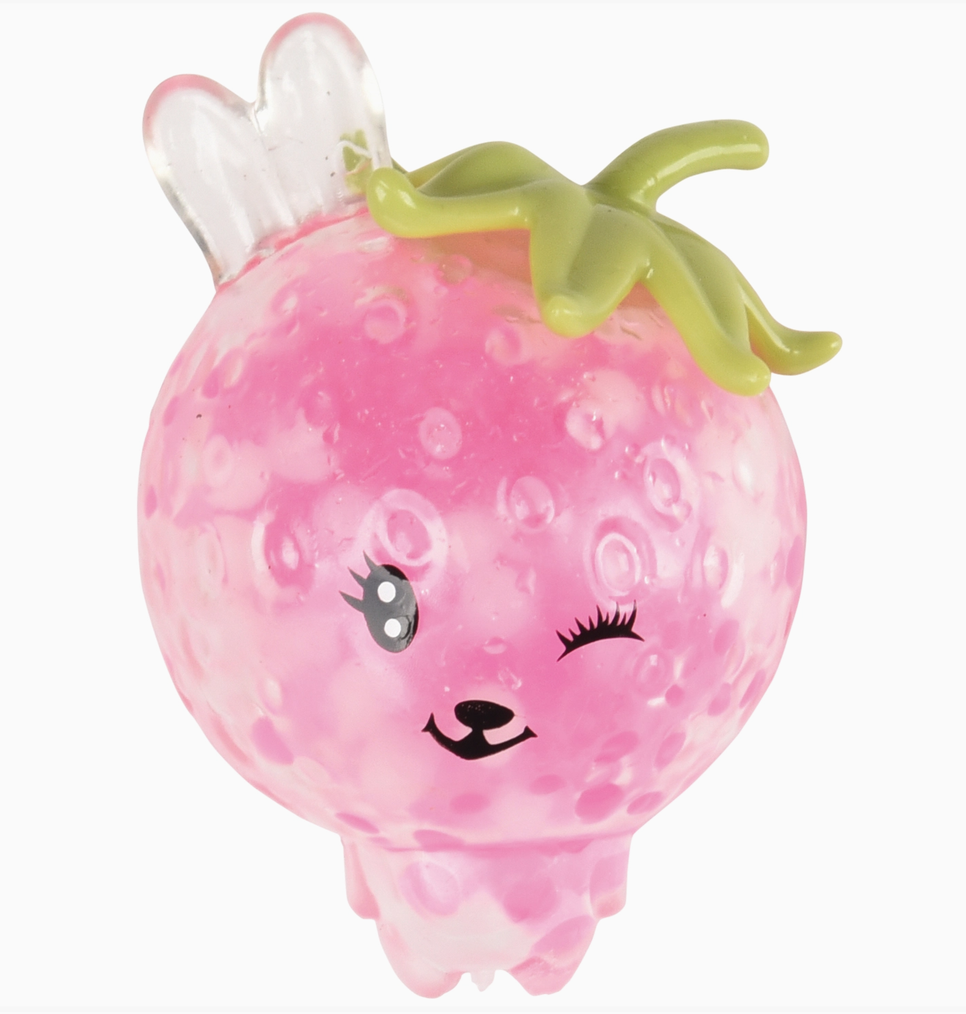 Pink grapefruit-shaped toy with a face on a white background