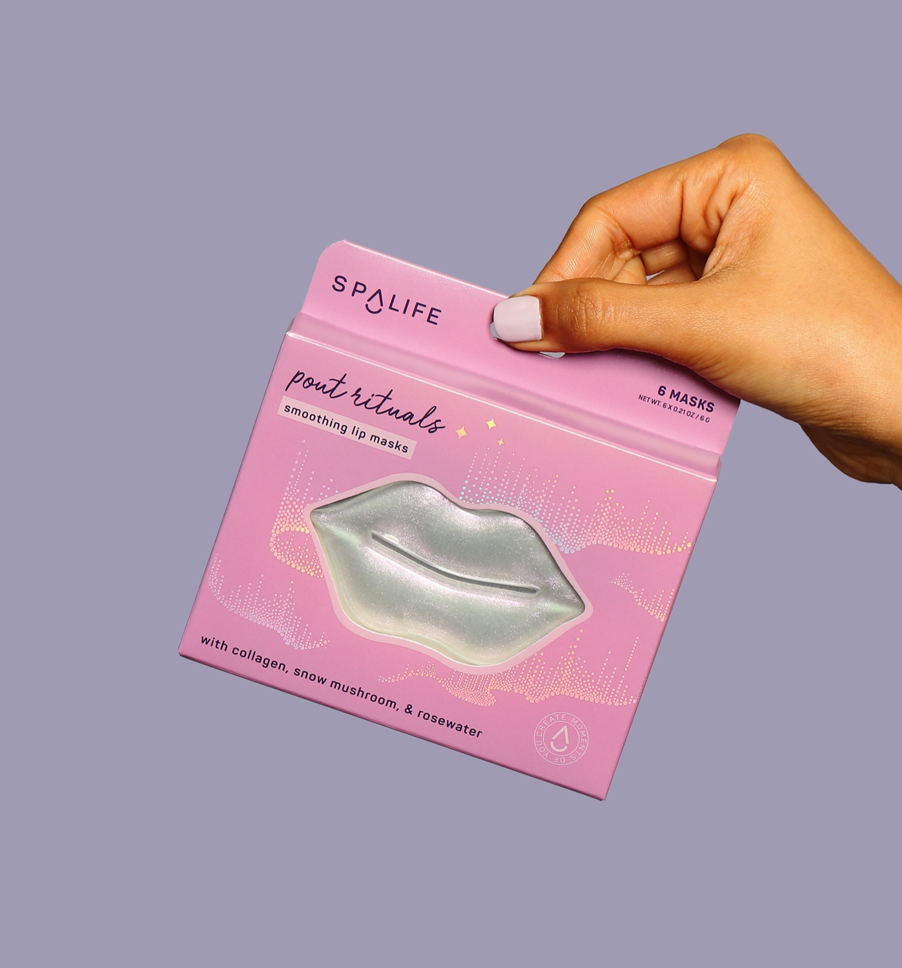 Hand holding a pink package of Spalife lip masks against a gray background