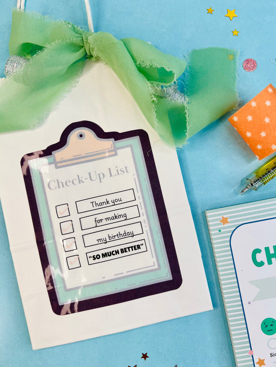 Check-up list card with a green bow on a blue background
