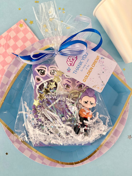 Packaged product with cartoon characters and a 'Thank You' tag on a blue surface