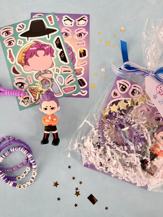 Sticker sheets and decorative items with cartoon characters on a light blue background