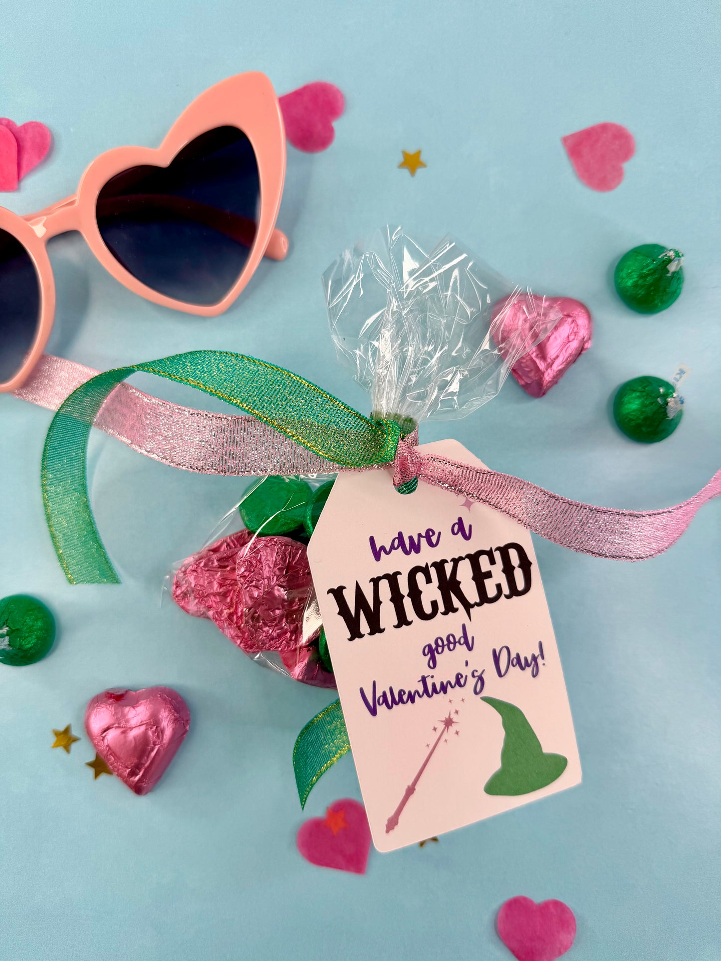 Gold heart-shaped candies with a 'Stay Golden Happy Valentine's Day' tag on a blue background.