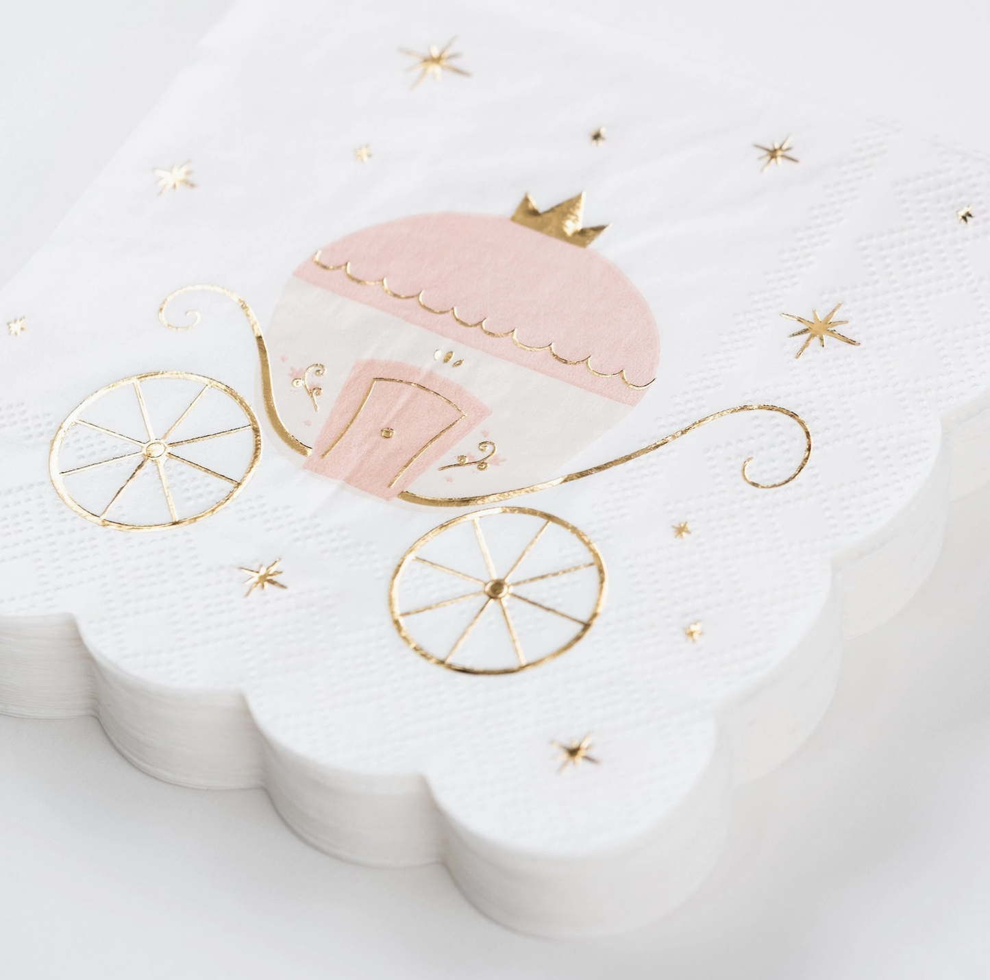 Pink and gold carriage on a white background with stars