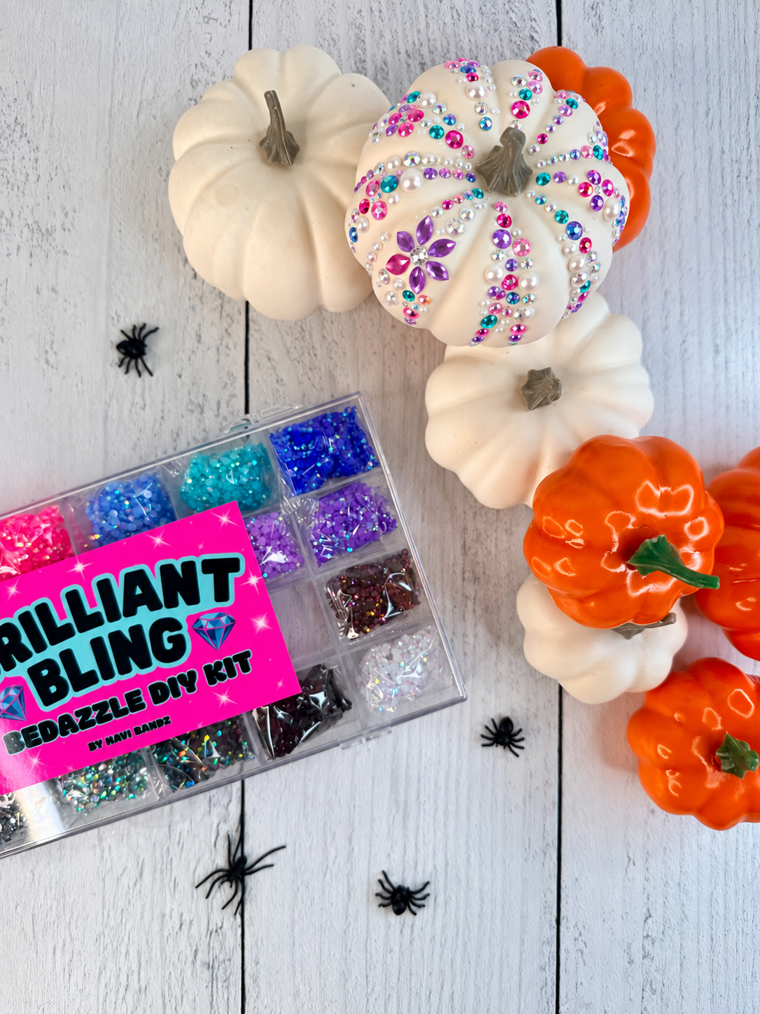 Pumpkin Bling Bar party activity set with white and orange pumpkins, rhinestone decorating kit, and printed party sign.