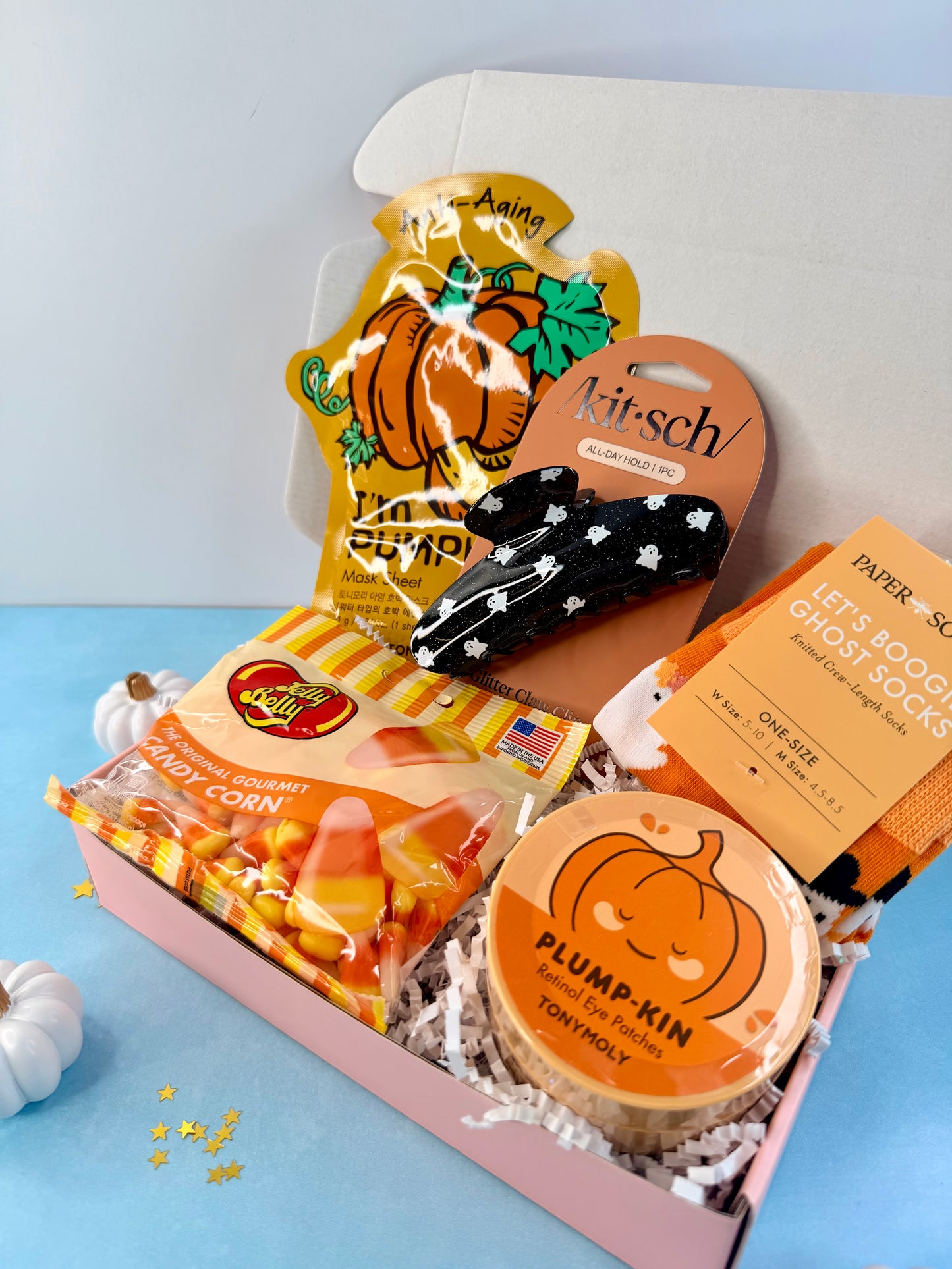 Ready-to-ship fall gift box for tweens and teens with ghost socks, candy corn, pumpkin skincare and a Halloween claw clip