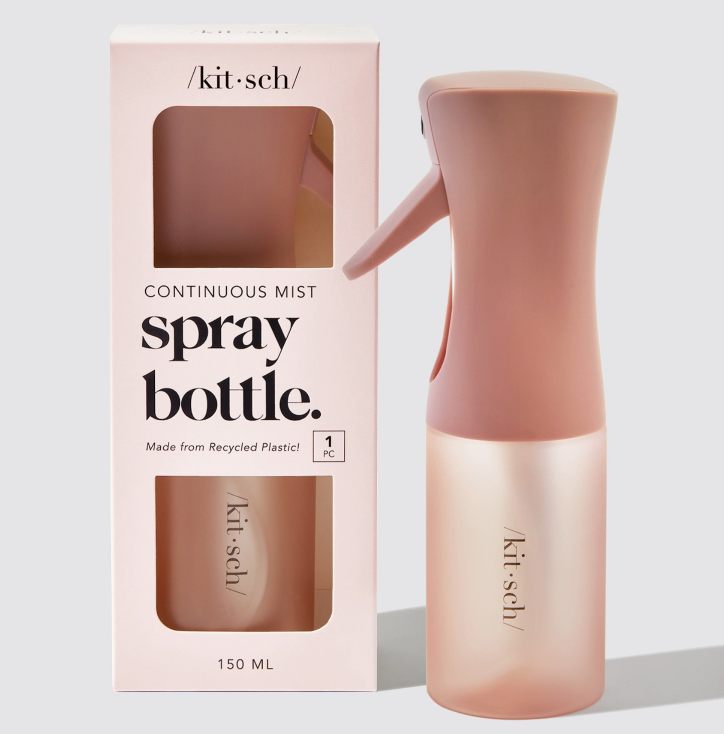 Pink spray bottle with matching packaging on a light gray background