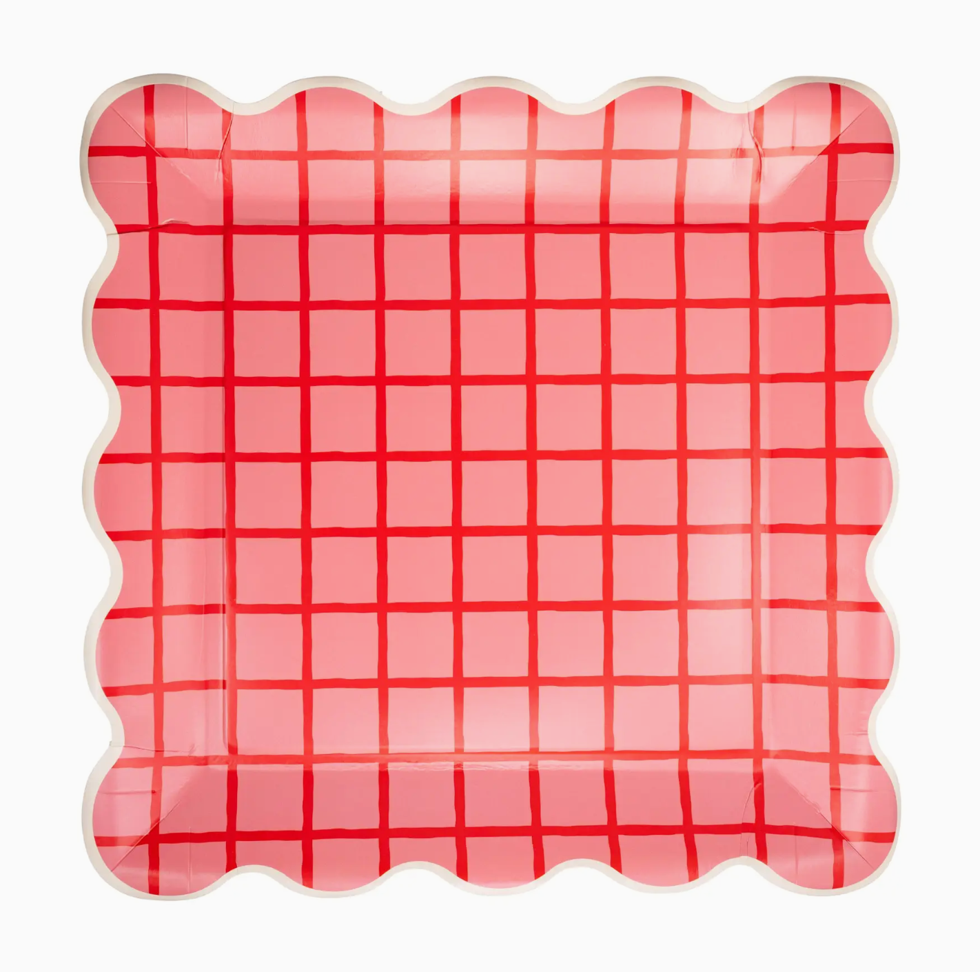 Pink and red checkered plate with scalloped edge on a white background