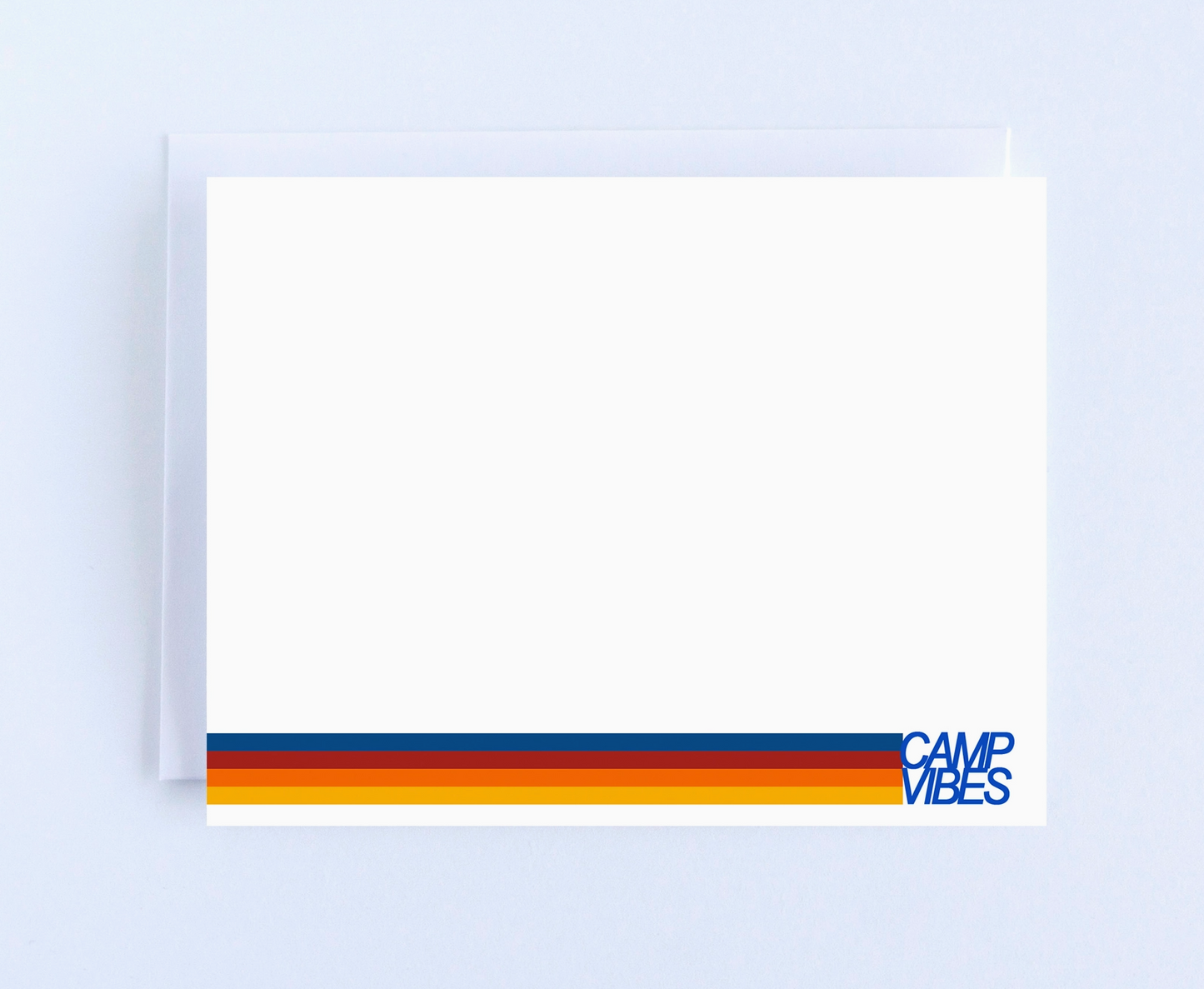 Note card with colorful stripe design and 'Camp Vibes' text on a light blue background