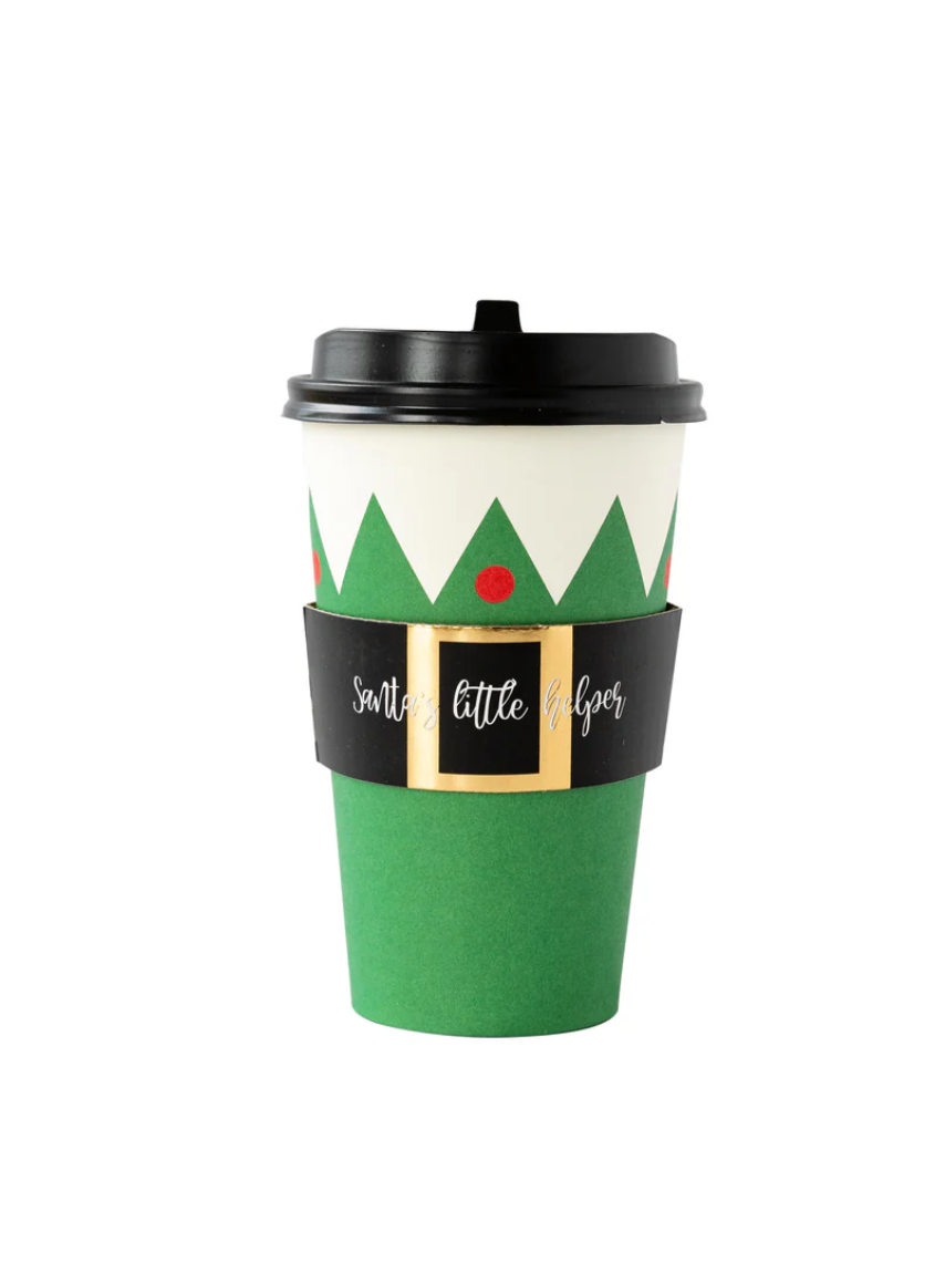 Green coffee cup with festive design on a white background