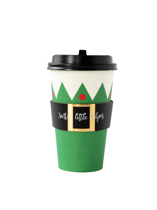 Green coffee cup with festive design on a white background