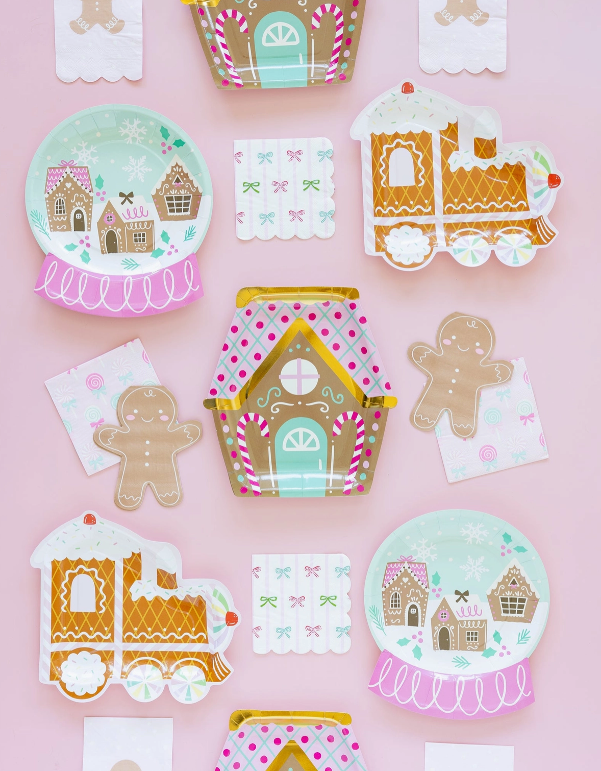 Set of gingerbread-themed stickers on a pink background