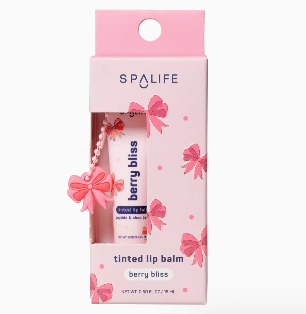 Spalife berry bliss tinted lip balm packaging with pink bows on a white background
